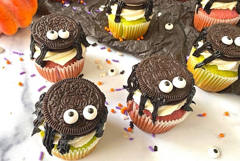 Oreo Spider Cupcakes for Halloween are a tasty treat that kids will love eating and making. The colorful and cute cupcakes are sure to be a huge hit at Halloween gatherings, birthday parties and fall activities with family and friends. The best part yet, this Halloween-inspired cupcake recipe is topped with an Oreo cookie spider.