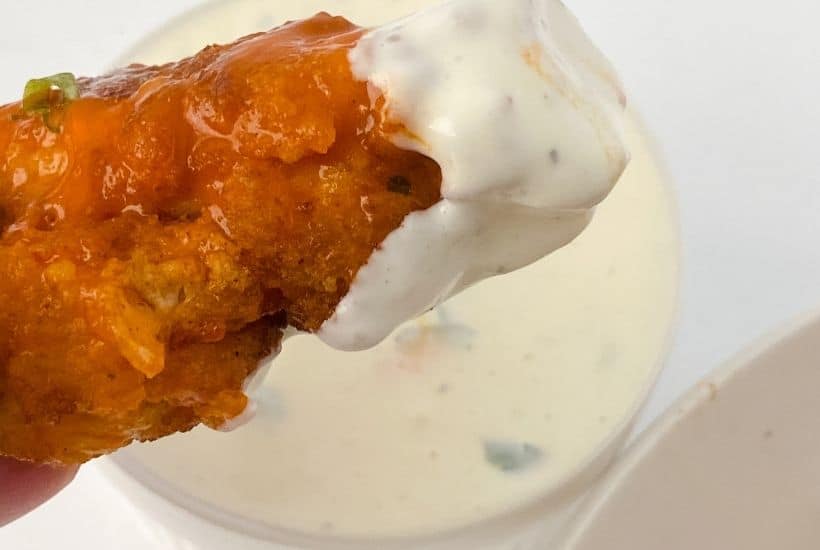 Easy homemade buffalo chicken tenders with ranch dipping sauce.