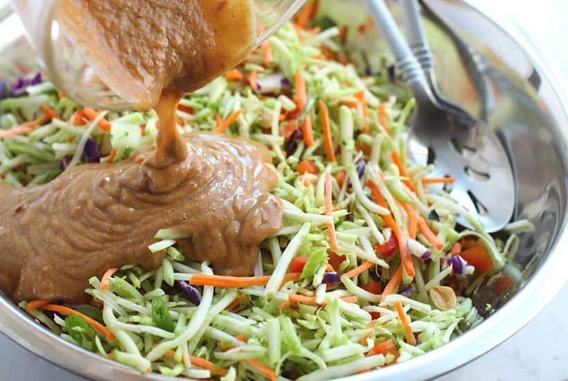 Enjoy the fresh taste of this flavorful yet healthy Low Carb Thai Peanut Salad. Packed with Asian flavors, it has a unique taste that is undeniably good, making it perfect for lunch, or dinner, whichever you prefer. This Thai recipe has everything - creamy Thai peanut sauce, crunchy broccoli slaw and peanuts. Even if you’re not following a low-carb diet, this is still a fantastic salad to make and enjoy.