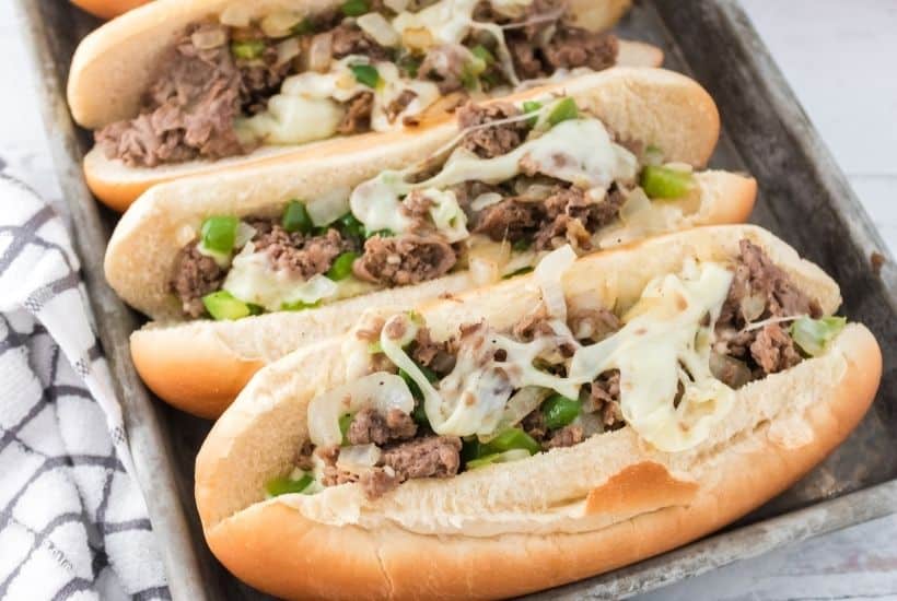 Enjoy the fresh flavor of a thinly sliced steak with cheese, onions, and peppers on rolls with this recipe for homemade Philly Cheesesteaks. If you’ve ever visited Philly (or any of the towns surrounding Philadelphia), you know that they are best known for the famous Philly Cheesesteak. This easy cheesesteak recipe is great to have for lunch and dinner. 