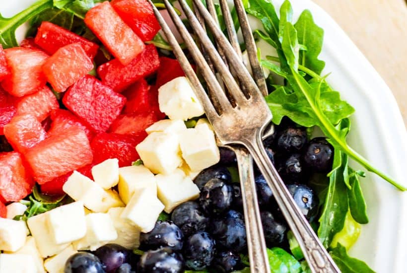 Watermelon Feta Arugula Salad is the perfect summer salad! The sweetness of the watermelon pairs perfectly with the salty feta, and the peppery arugula gives it a nice bite. If you're looking for a delicious summer salad, then this Watermelon Feta Arugula Salad is just what you've been looking for! It also makes a great patriotic recipe for your 4th of July party.