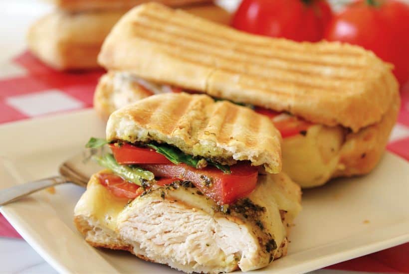 Skip the traditional ham and cheese and make a more fulfilling meal with these Pesto Chicken Sandwiches. Made with chicken, cheese, and tomatoes, you will love the taste of this flavorful sandwich.