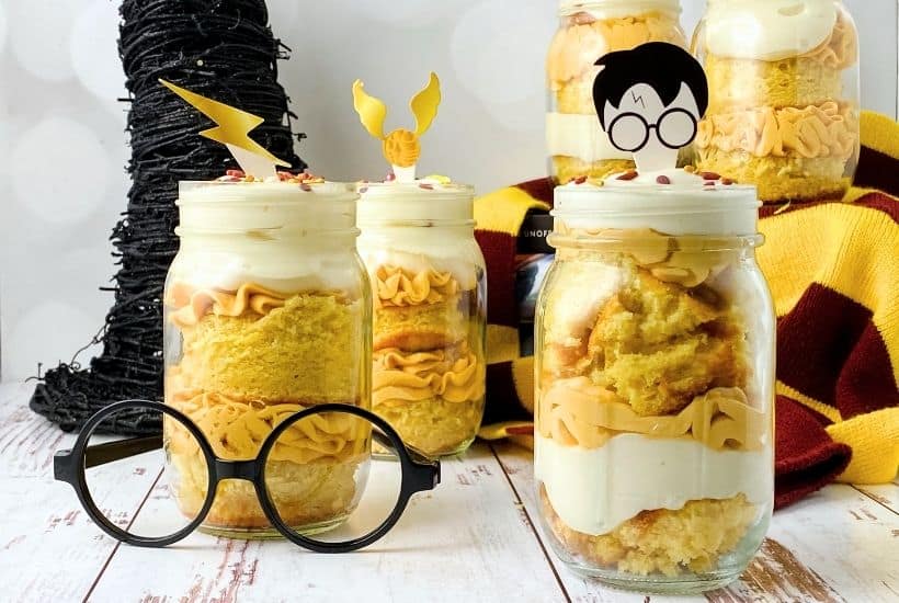 Harry Potter lovers can rejoice over this fun, flavorful recipe for Butterbeer Cake Jars. They're a sweet, decadent treat, perfect for serving at Harry Potter-themed parties!