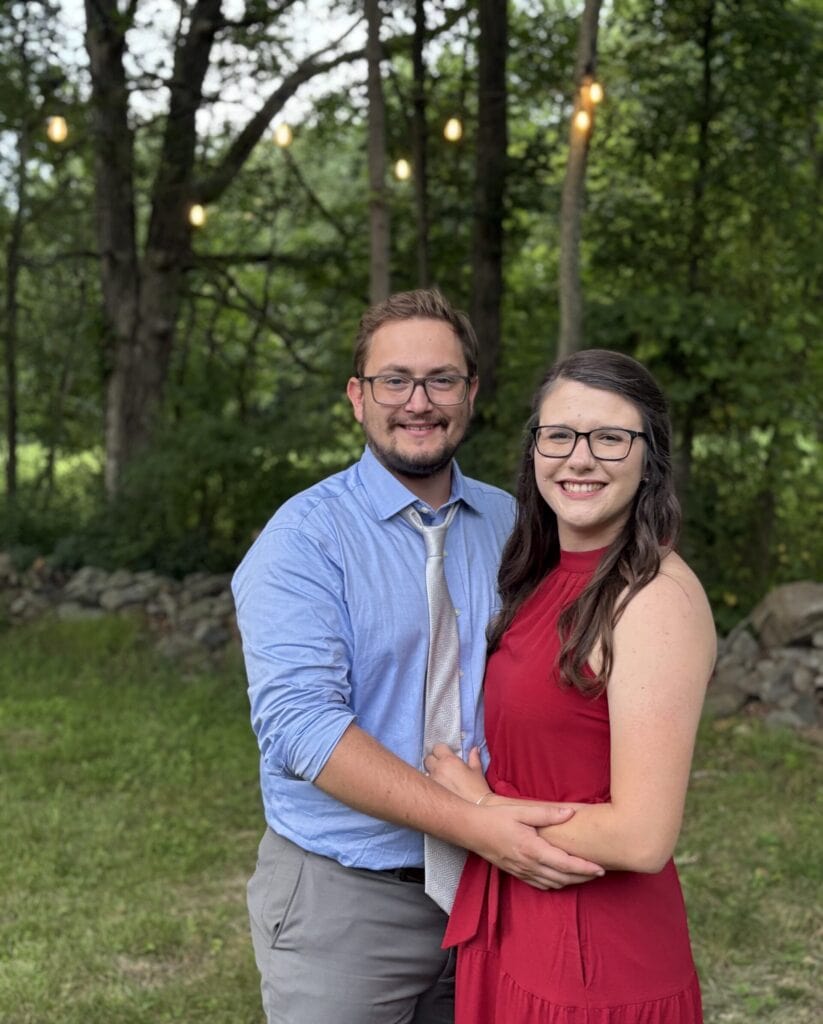 Cute couple enjoying a romantic outdoor getaway in nature, perfect for 407 and Beyond Vacation Co. adventures.