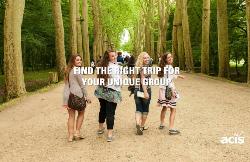 students walking in a woooded park