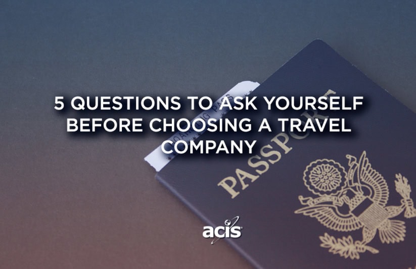 Choosing an educational tour company title in front of a passport