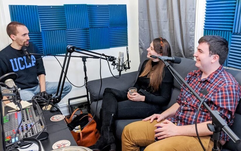 Guests Taylor and Matt speaking in the studio with co-host Erik Shell.