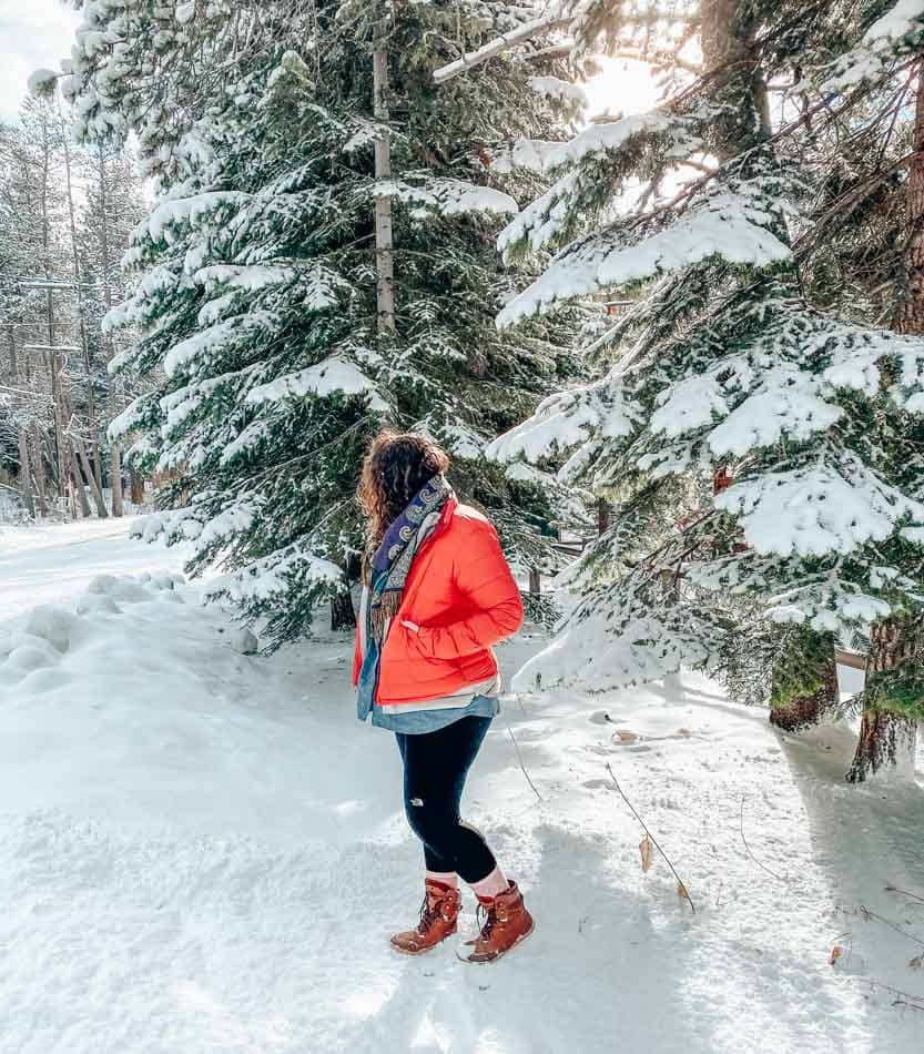 Lia wearing Vivobarefoot Tracker Boots in the snow in Lake Tahoe.