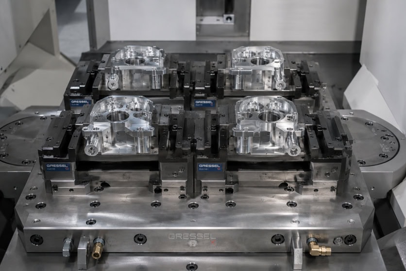 FIXTURE AND WORKHOLDING STRATEGIES FOR MULTI SETUP MACHINING
