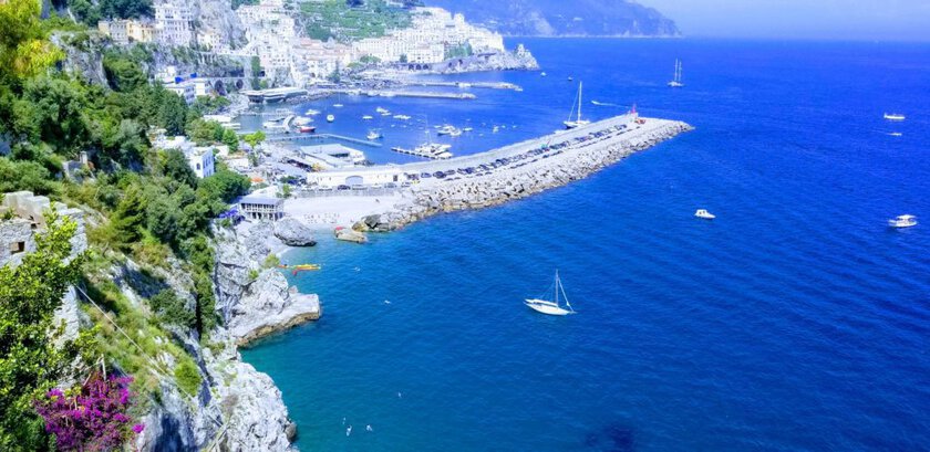 Amalfi although noted a best place to see on the coast is much more beautiful from above. It is way too touristy in town.