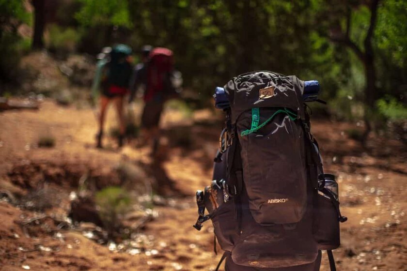 man carring a backpack