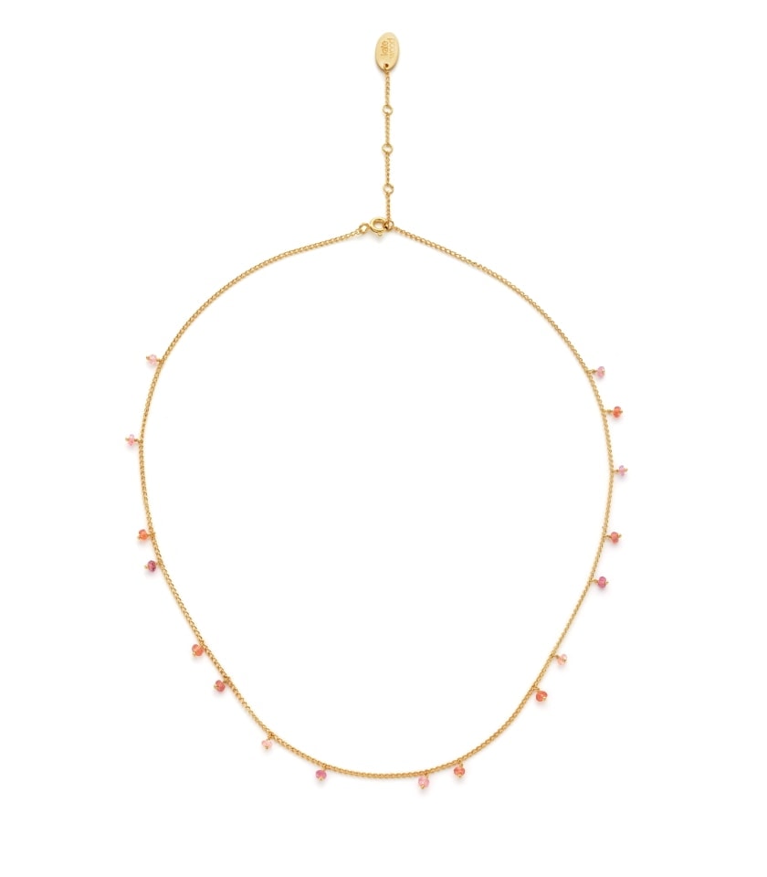 Photo of necklace with orange and peach sapphires and pink tourmalines on white background
