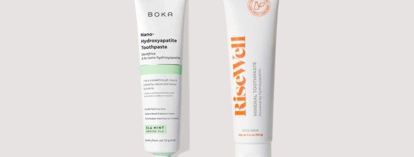 Boka Ela Mint and RiseWell Mineral nano-hydroxyapatite toothpaste tubes side by side on a neutral background
