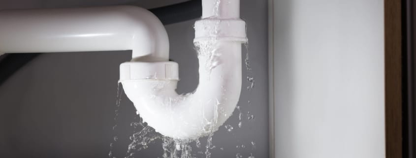 Image of leaking u joint under kitchen sink.