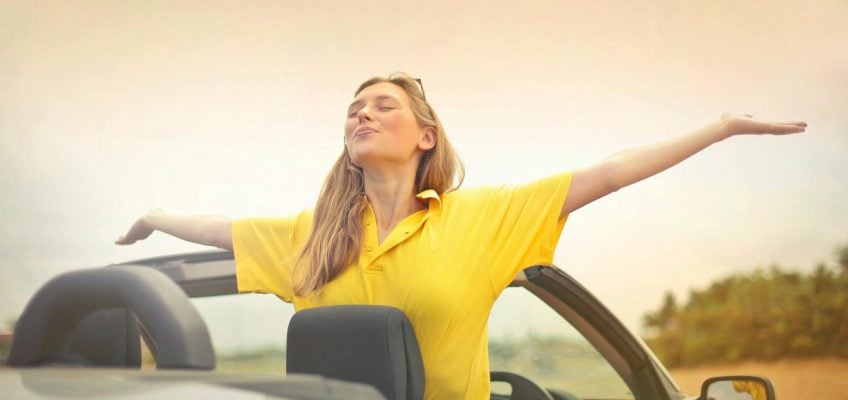 woman in convertible