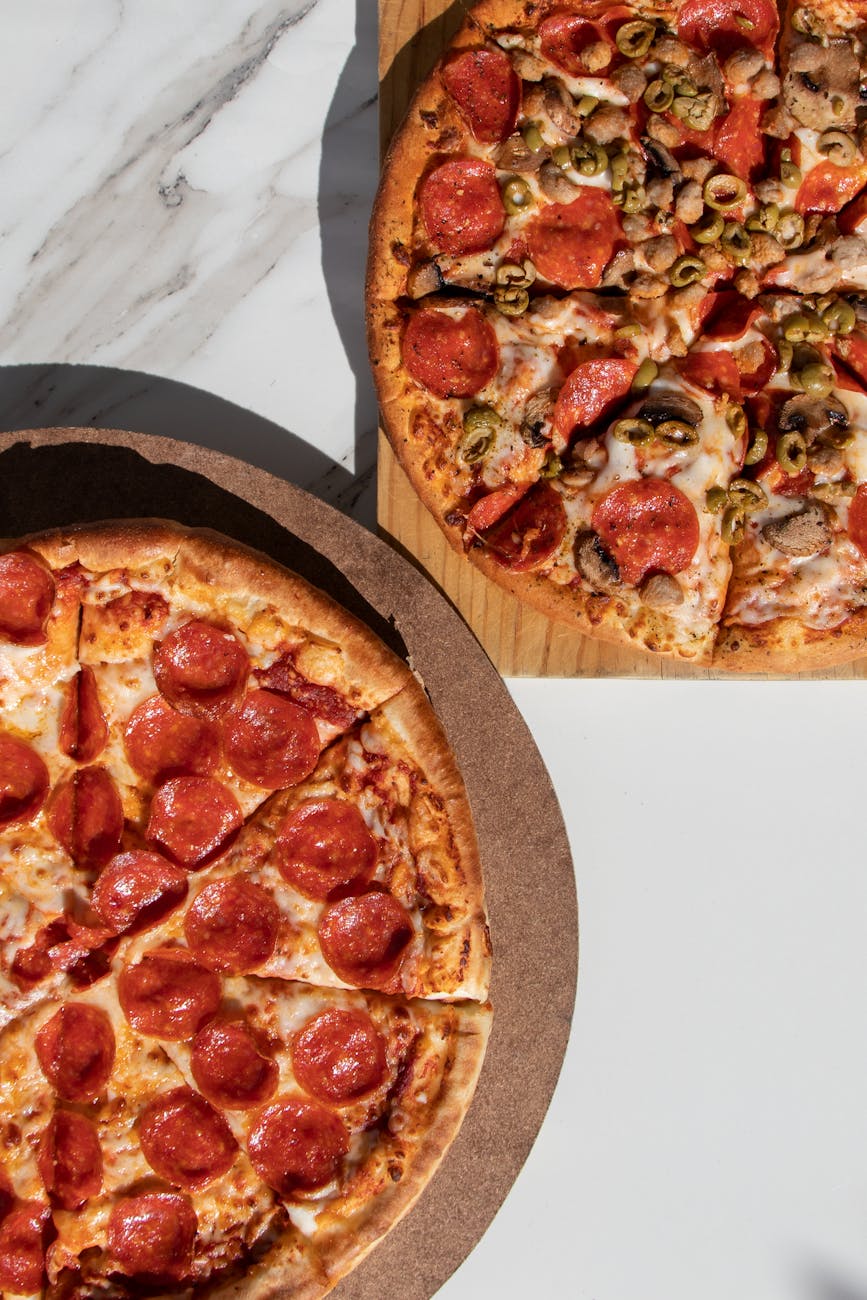 pizza on brown wooden tray