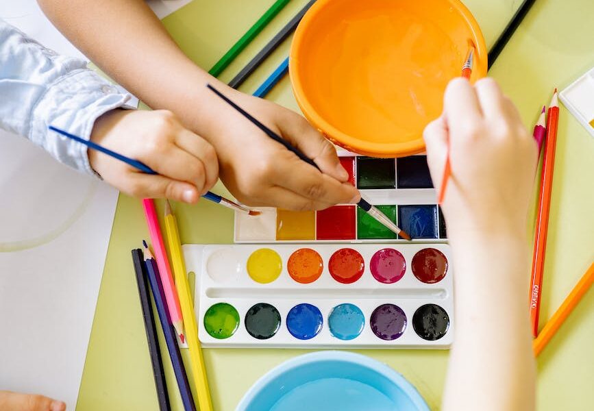 children painting with water color