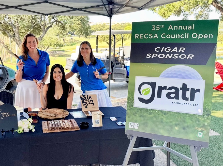 Cigar Bella female cigar roller at a company-sponsored golf tournament near Spicewood Texas
