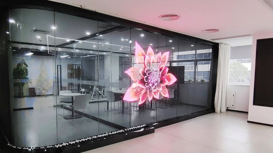 InviAir Holographic LED Screen on glass wall displaying vibrant flower content - slim transparent design that minimizes hardware presence