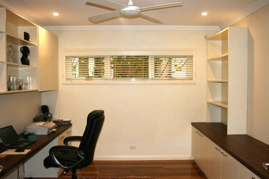 This two-seater home office with built-in bookcases was built for a customer in Pymble with shaker-style doors and timber walnut benchtop. Finished in satin white ploy paint with clear satin on the benchtop using Blum hinges and draw runner.