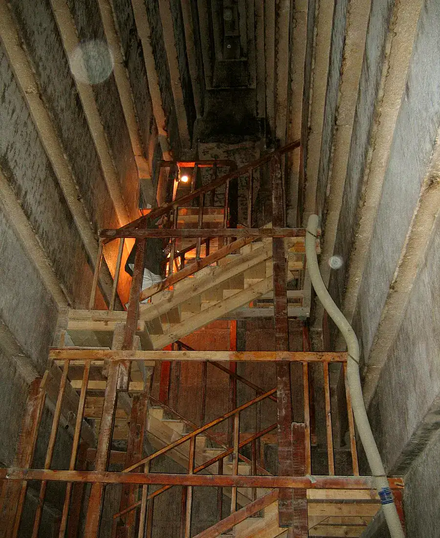 Corbelled stone chamber with a high inward-stepping ceiling