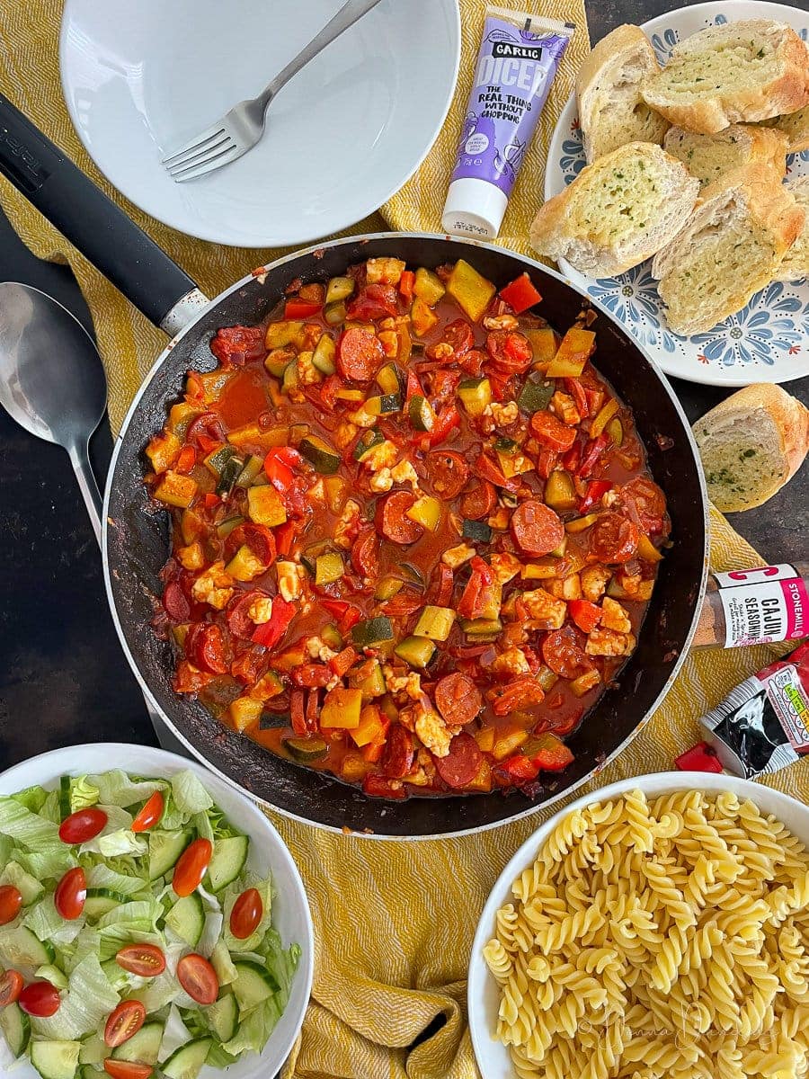 Halloumi and Chorizo Pasta in tomato sauce in frying pan.
