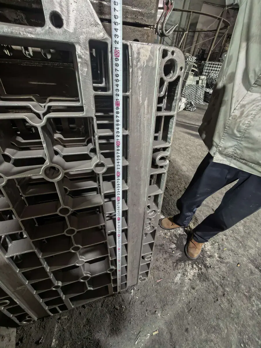 Tape measure running along the length of an upright furnace base tray