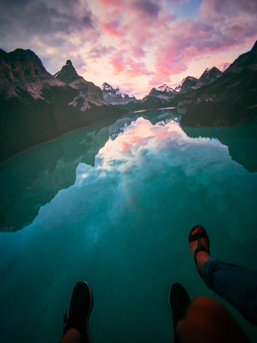 Feet dangling from the Flyover Las Vegas ride as the show takes you over a lake at Jasper National Park in Canada.