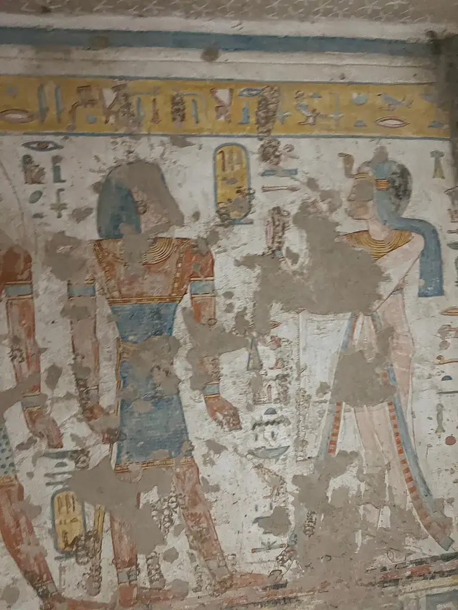 Queen Titi before protective deities in tomb QV52