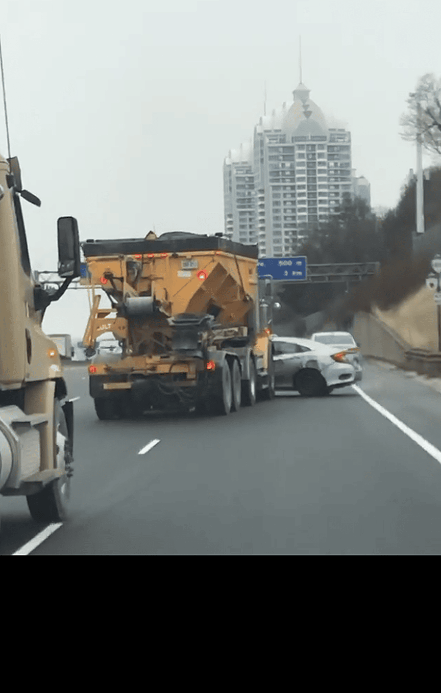 Bizarre incident on 401: Construction truck pushes car sideways