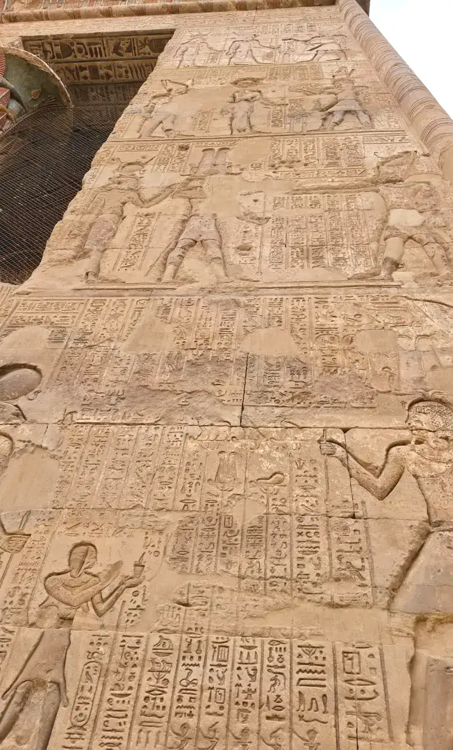 Hieroglyphic reliefs carved on the facade of the Temple of Esna