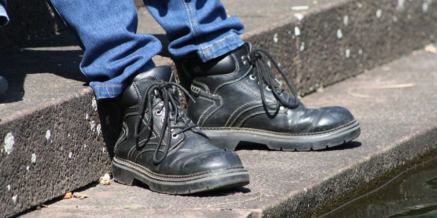 new stiff work boots