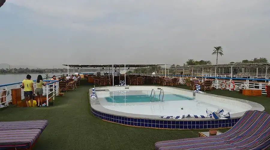 Sun deck swimming pool with open views across the Nile