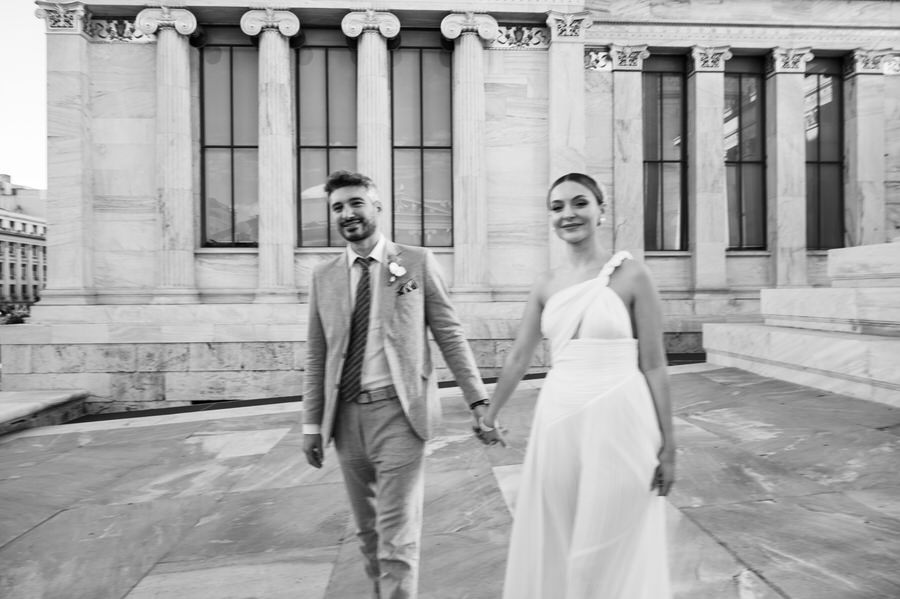 Stylish bride and groom in Athens architecture