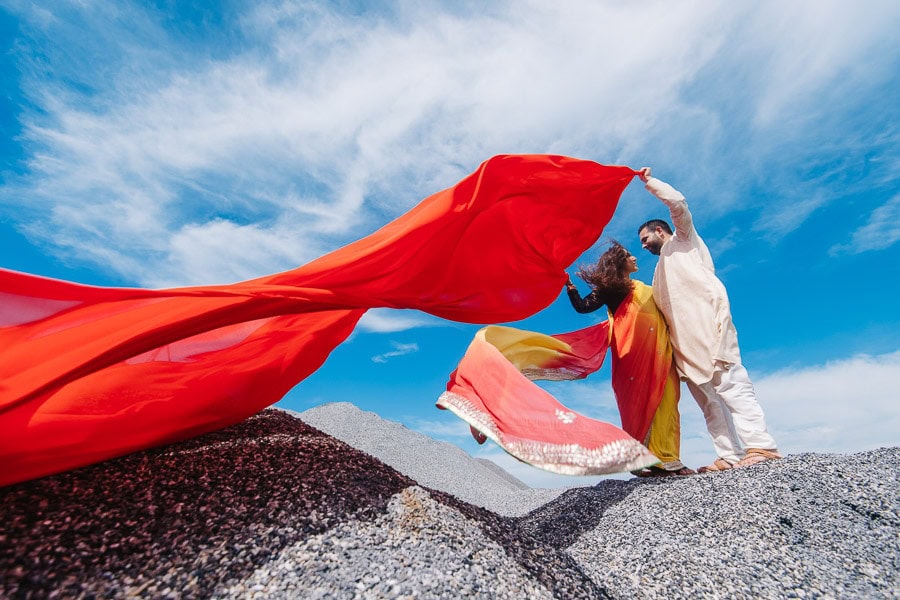 Prewedding indian on the rocks sky fabric couple
