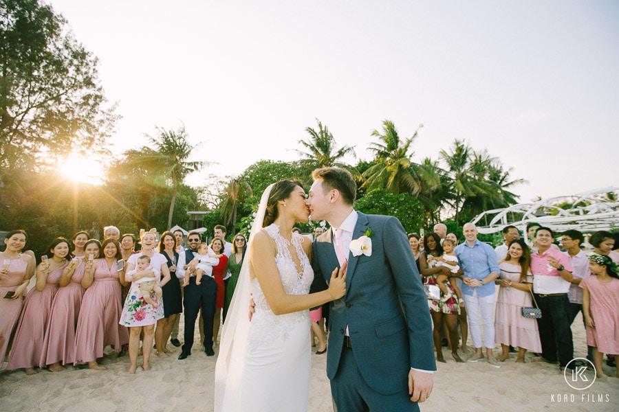 Western Wedding Kiss among family at Veranda Resort & Villas Hua Hin