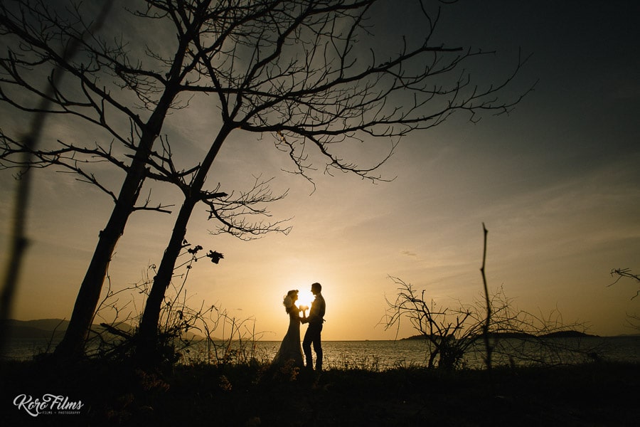 Western Wedding lake before sunset silhouette