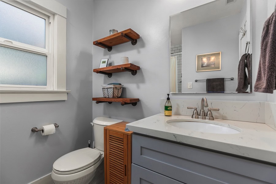 2632 Madison Avenue - Bathroom Area with Wood Shelves and a Window