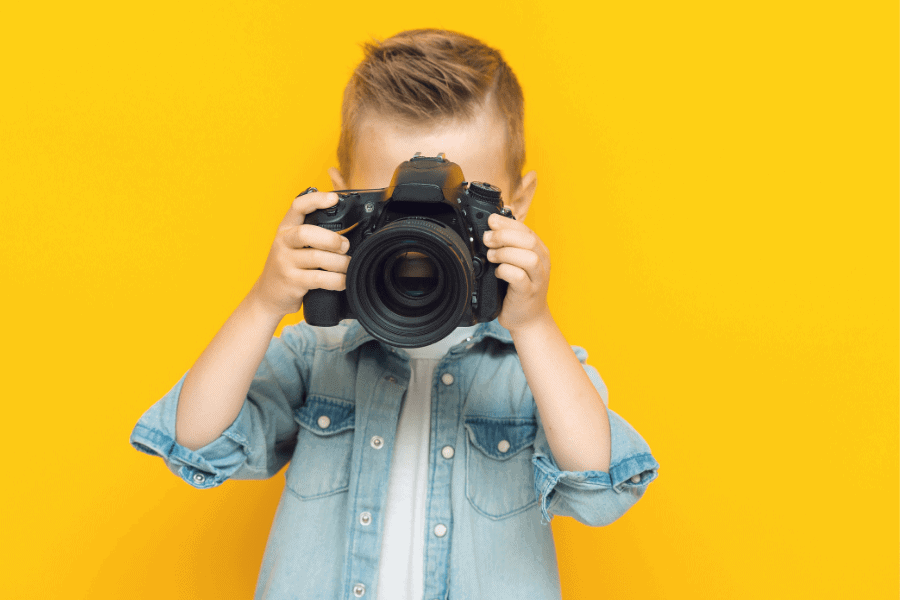 kid taking a photo