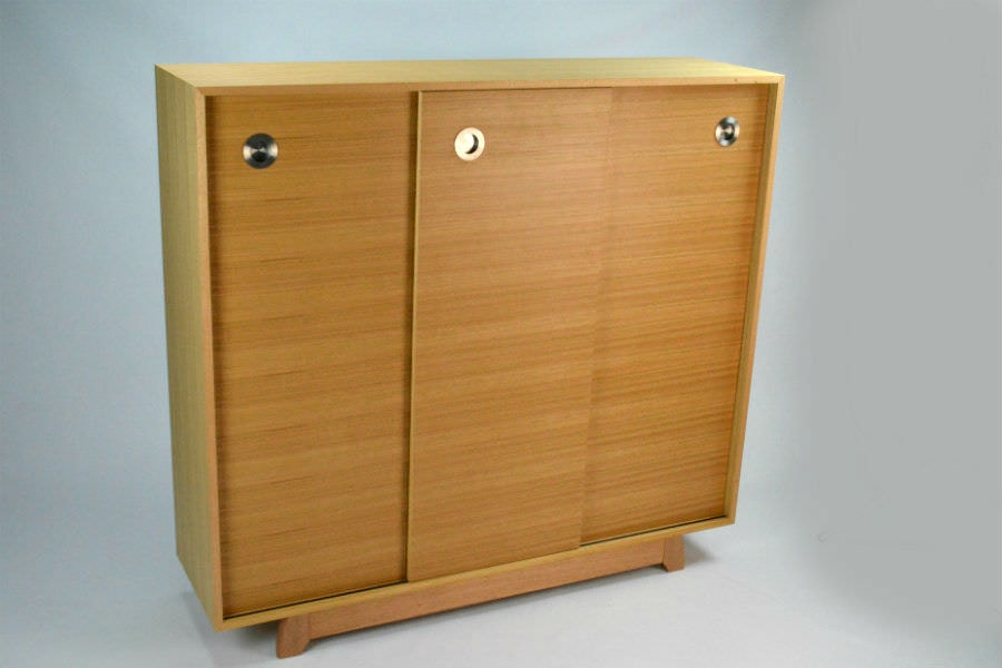 Custom made for a customer to store DVD. Made with sliding doors for easy access. Would be a great addition to any living room or hallway. Custom made timber furniture. Custom made furniture and furniture maker.