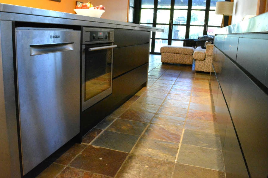 Custom made kitchen With cantilever zinc bench top. Custom made joinery and cabinet making