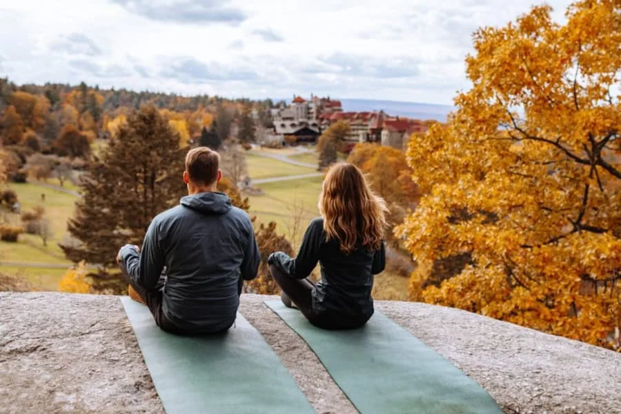 Couple Practicing Mindfulness During a Romantic Getaway to Mohonk in the Fall