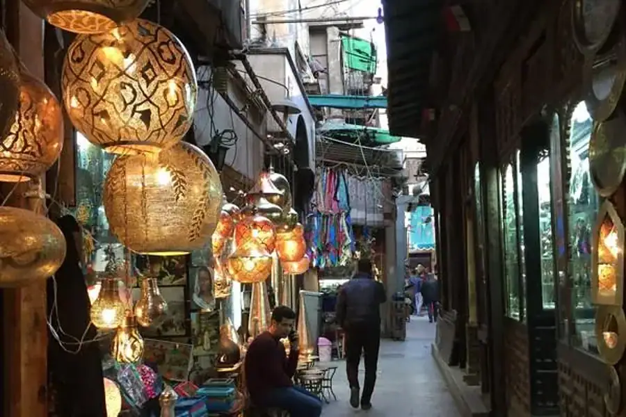 Colorful traditional lanterns hanging above market shops