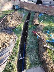 Professional plumbing pipe repair in a residential home