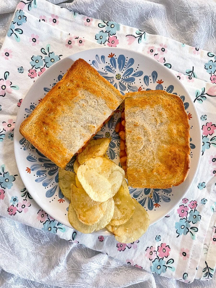 toastie with crispys on plate.