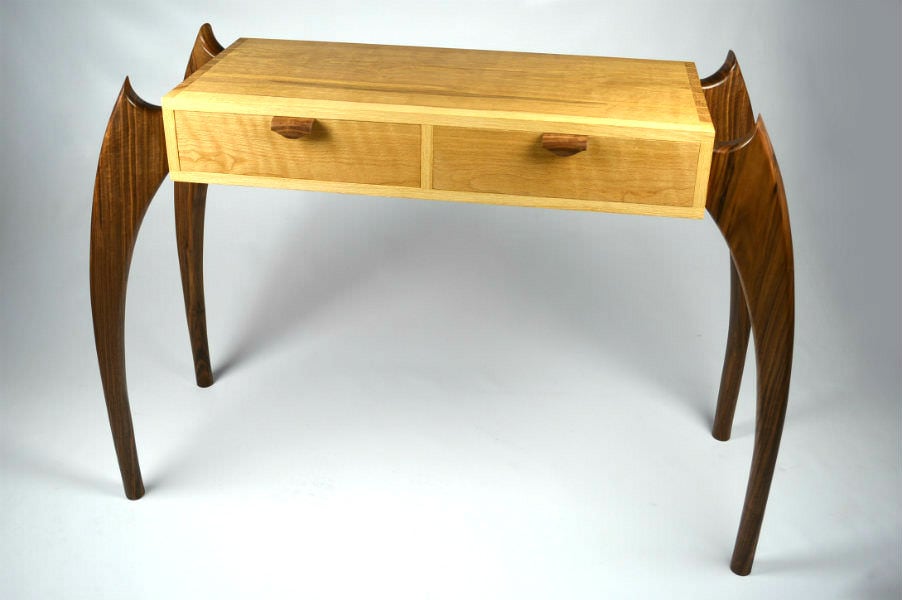 Custom made timber furniture. Custom made furniture and furniture maker. WHITE OAK & BLACK WALNUT CONSOLE TABLE Made from White Oak and Black Walnut featuring our unique leg design for an elegant yet dynamic classic modern look. With hand cut dovetails construction for strength. This versatile design can also be made as a desk.