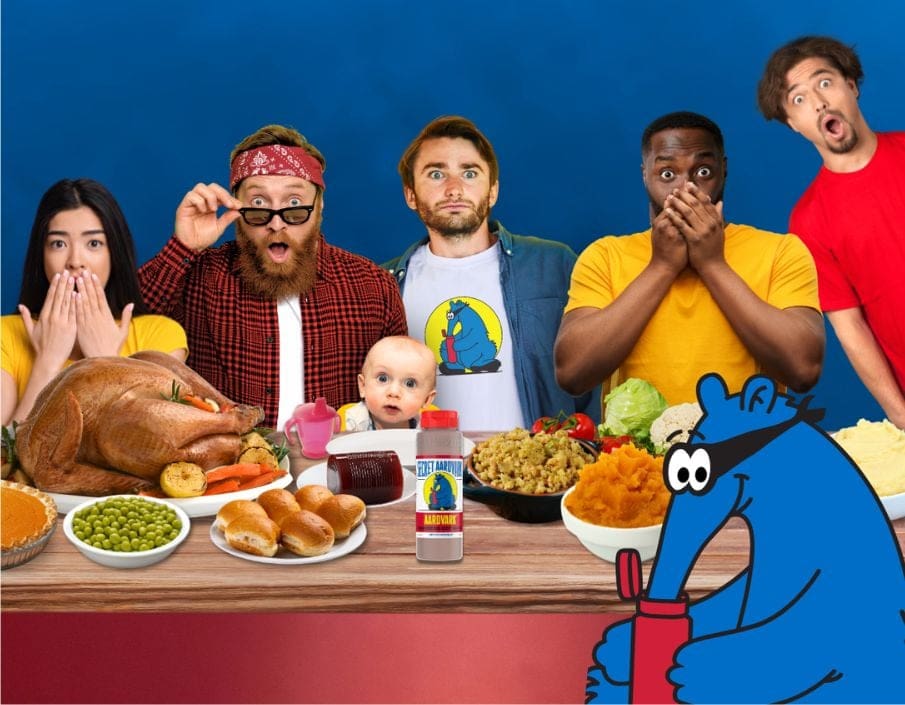 A group of family and friends at the Thanksiving dining room table, with stricken looks on their faces, as they try to avoid awkward holiday dinner talk.