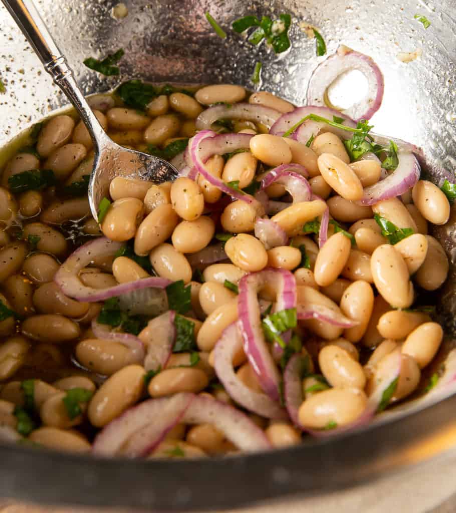 marinated white beans make the broccolini salad dressing