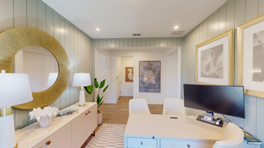 Matterport 3D virtual tour technology on a tablet screen showing Orlando real estate.