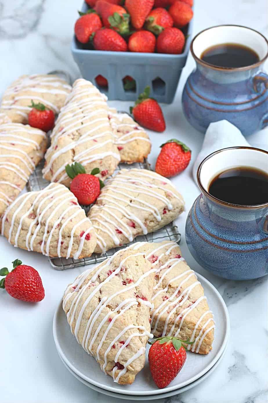 Impress your family with homemade baked goods that they can have for breakfast or a snack. This Strawberry Scones recipe is fun to make and will stay fresh for several days. These fresh-baked scones are soft, flaky and bursting with juicy strawberries! This is also a great freezer friendly recipe. Bake a batch of these fresh strawberry scones and freeze to enjoy at a later time.